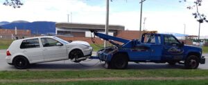 Surrey Scrap Cars towing old vehicle